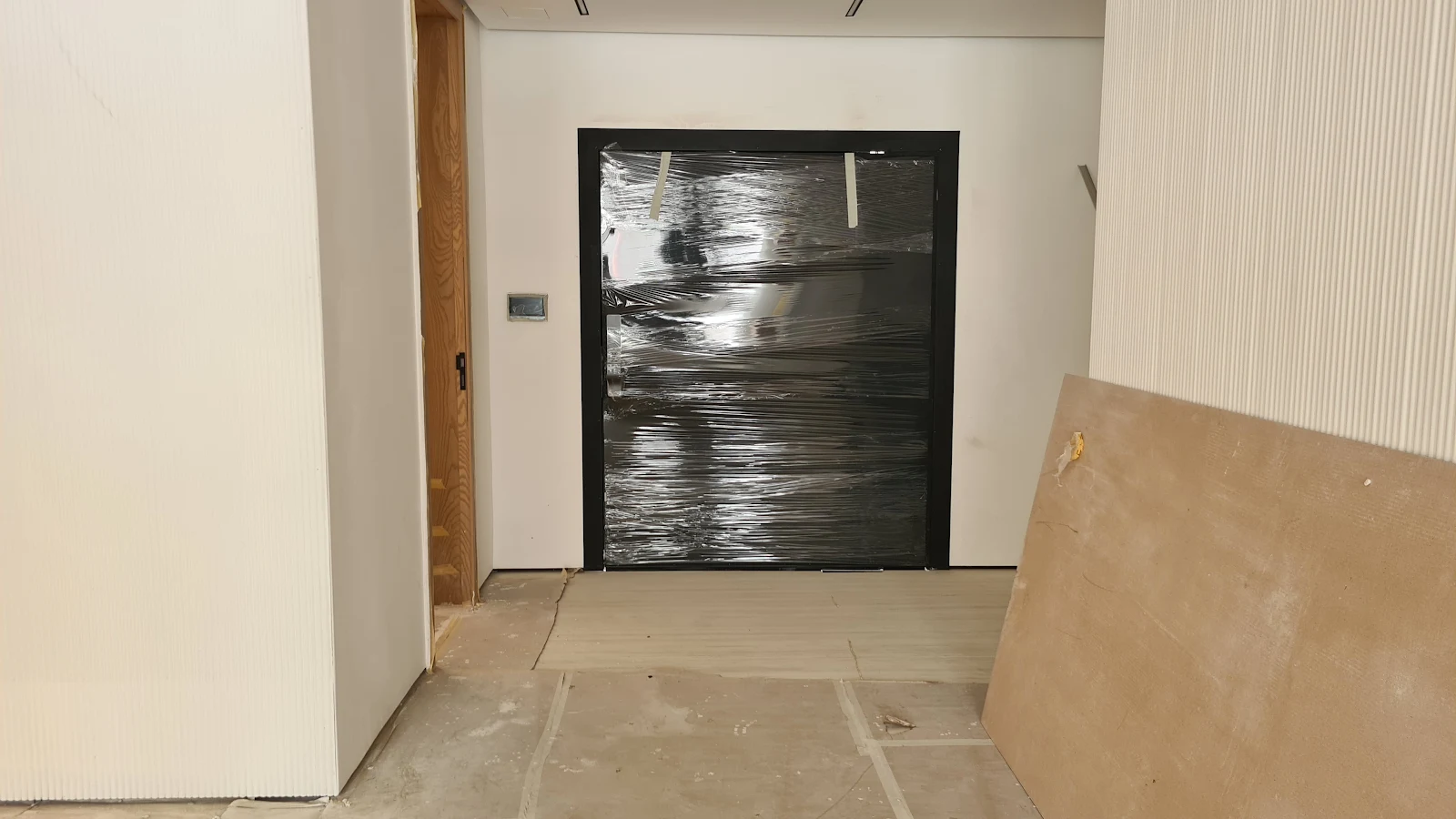 Black matte pivot entrance door