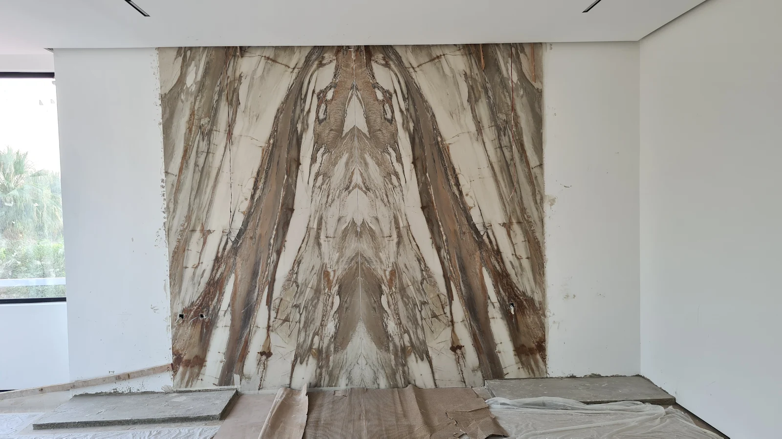 Bookmatched porcelain headboard